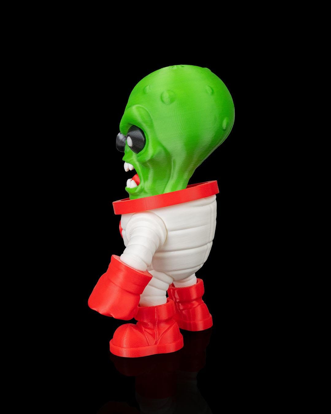 Retro Sci-Fi Alien Figurine – Green Space Invader with Blaster